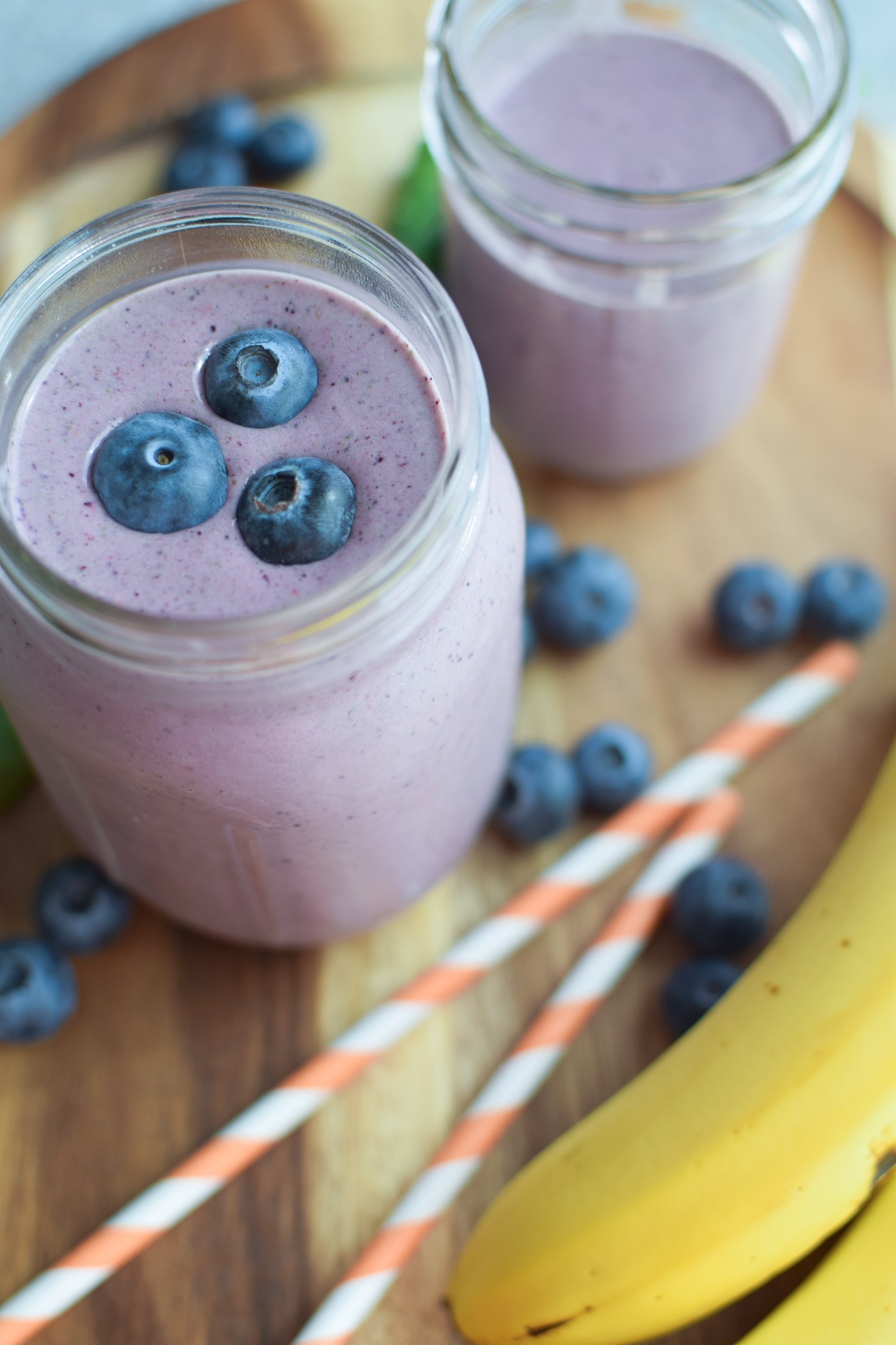 Our very favorite go-to Berry Protein Smoothies recipe in two ways! Packed with berries, greens, and protein, and super easy for meal prepping! - ProjectMealPlan.com