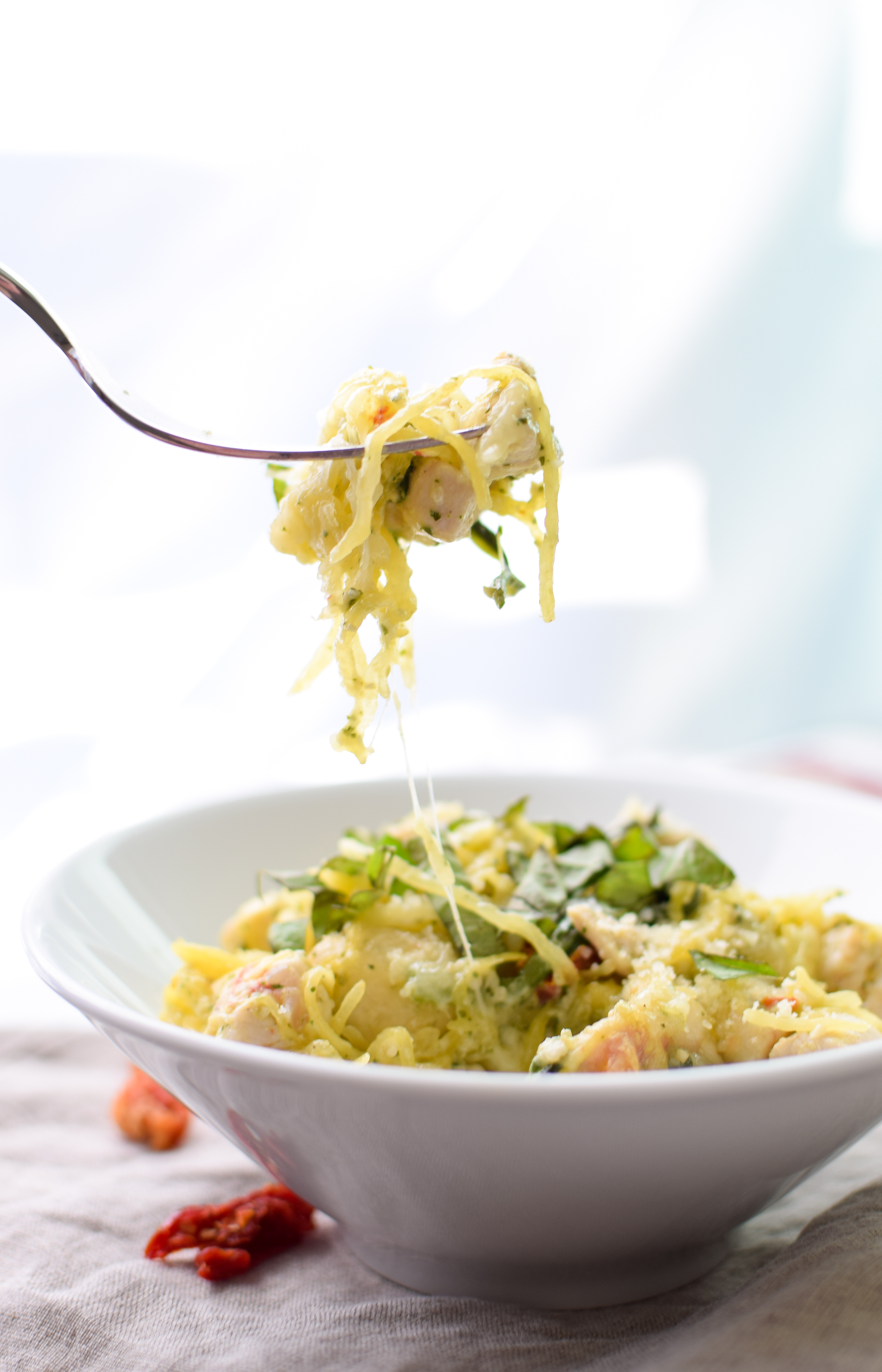 Pesto Chicken Stuffed Spaghetti Squash - Pesto, chicken, spinach, and a little greek yogurt for creamy goodness! Super healthy dinner for two! - ProjectMealPlan.com