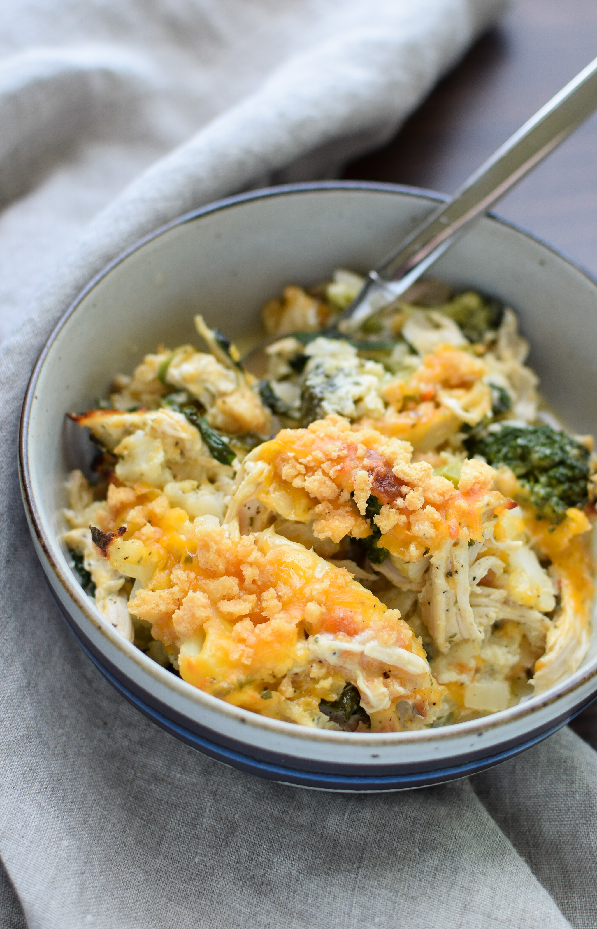 A bowl of Veggie Loaded Rotisserie Chicken Casserole.