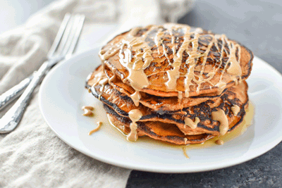 5-Ingredient Sweet Potato Banana Pancakes - Banana, sweet potato, nut butter, eggs and cinnamon are all you need to make these simple pancakes happen. #sweetpotatopancakes