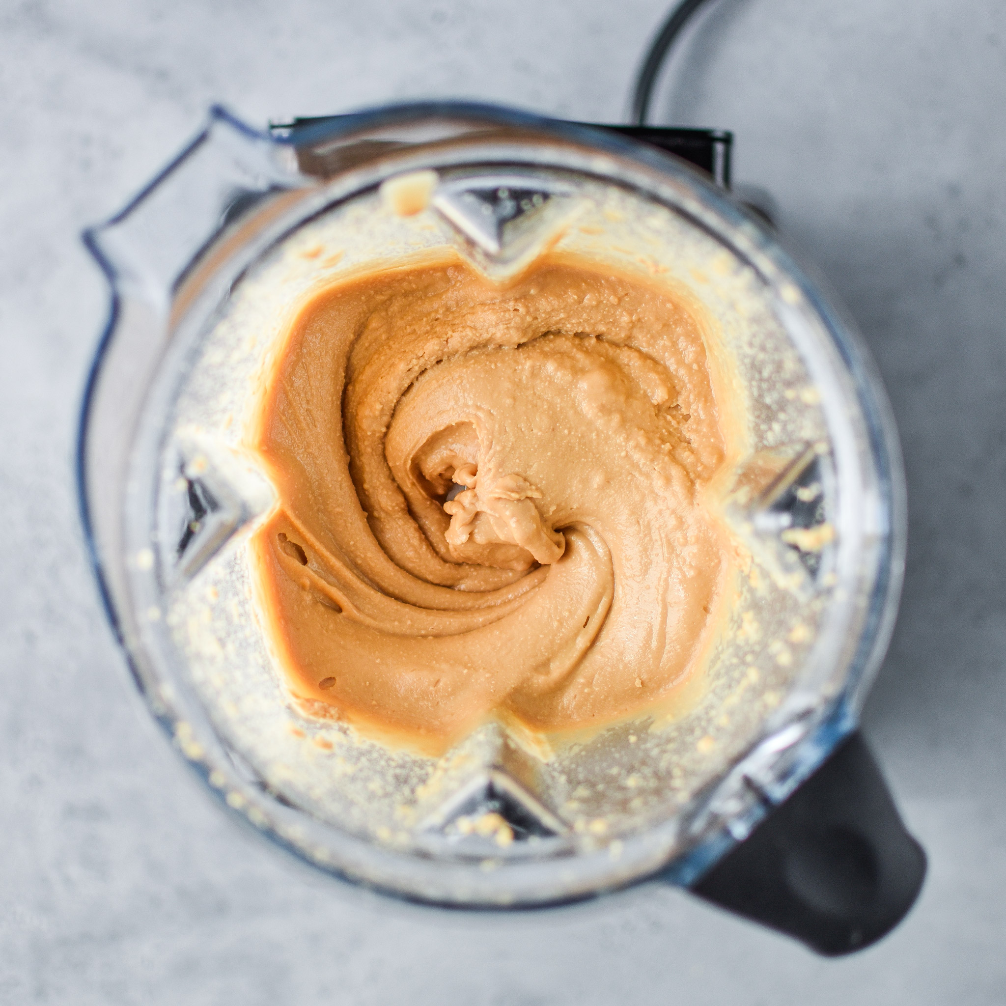 Making homemade peanut butter in the vitamix to find out Store bought vs Homemade Peanut Butter: Which is Cheaper?