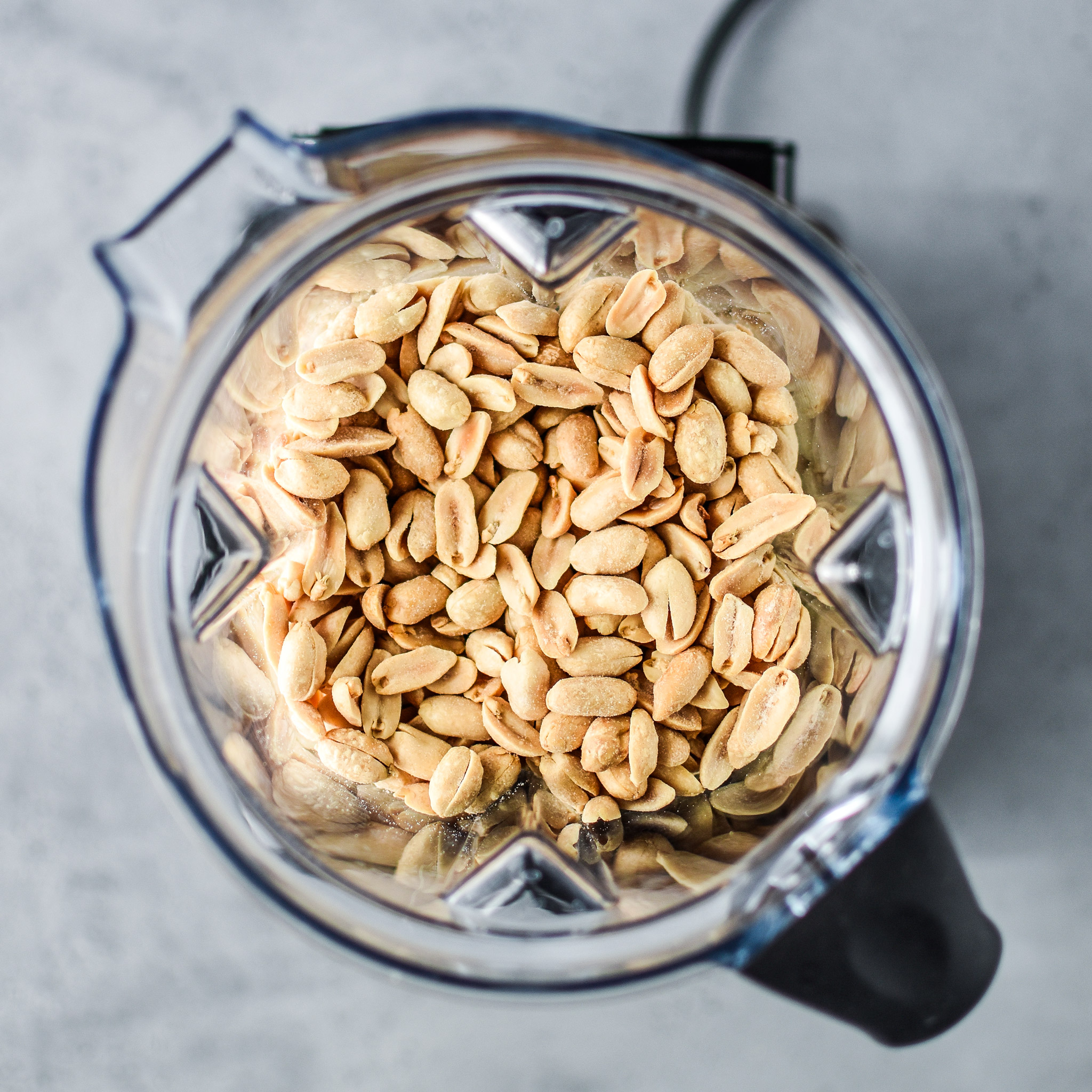 Making homemade peanut butter in the vitamix to find out Store bought vs Homemade Peanut Butter: Which is Cheaper?