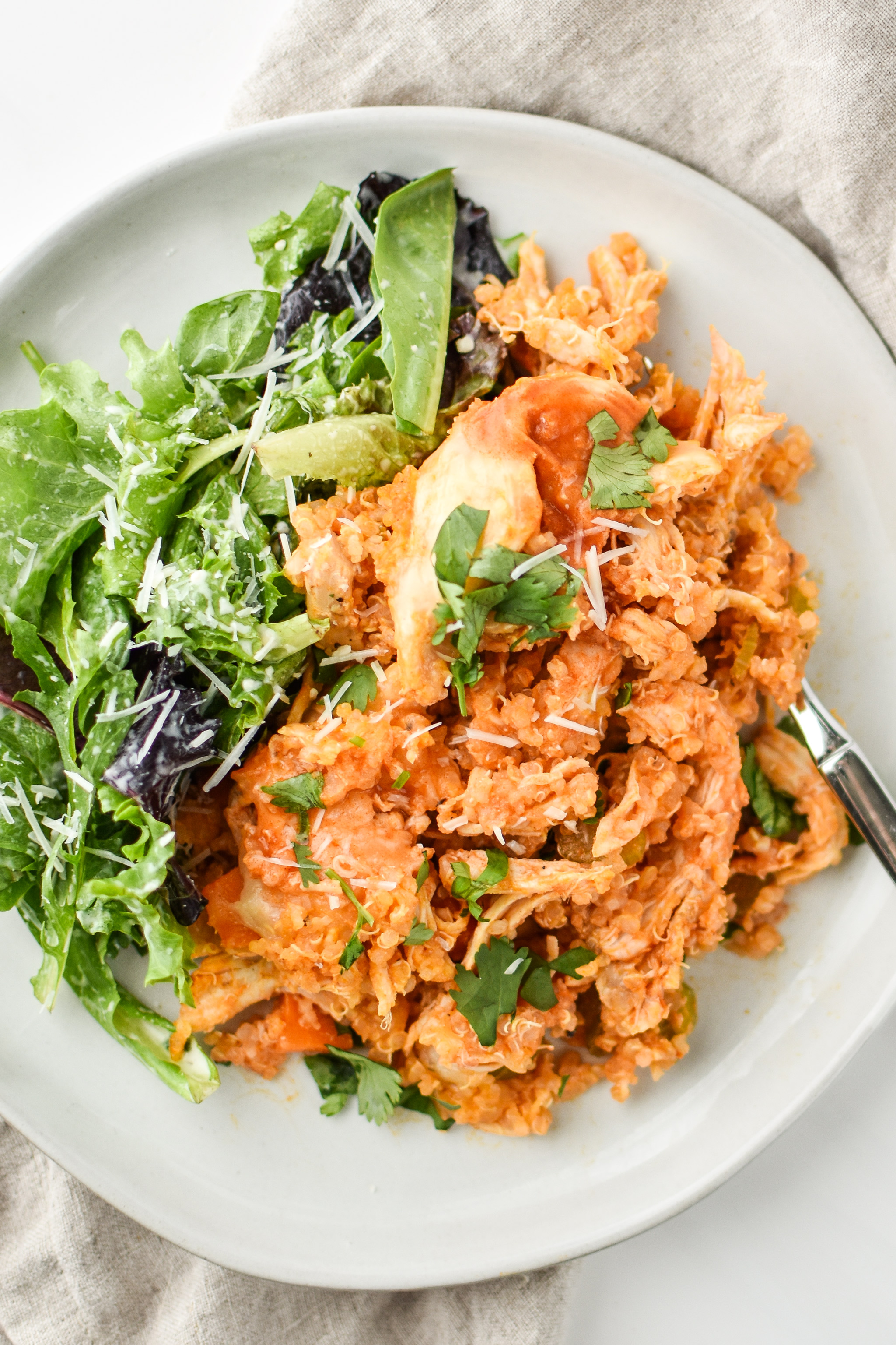 Buffalo Chicken Quinoa Bake served with salad