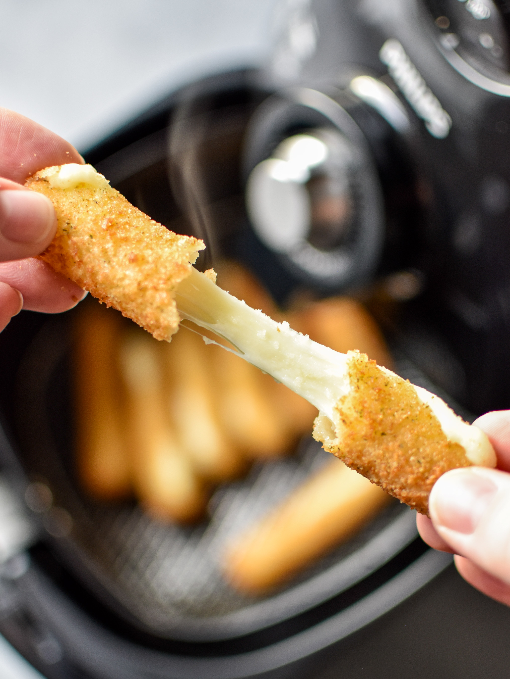 Cheesy mozzarella stick made in the air fryer!