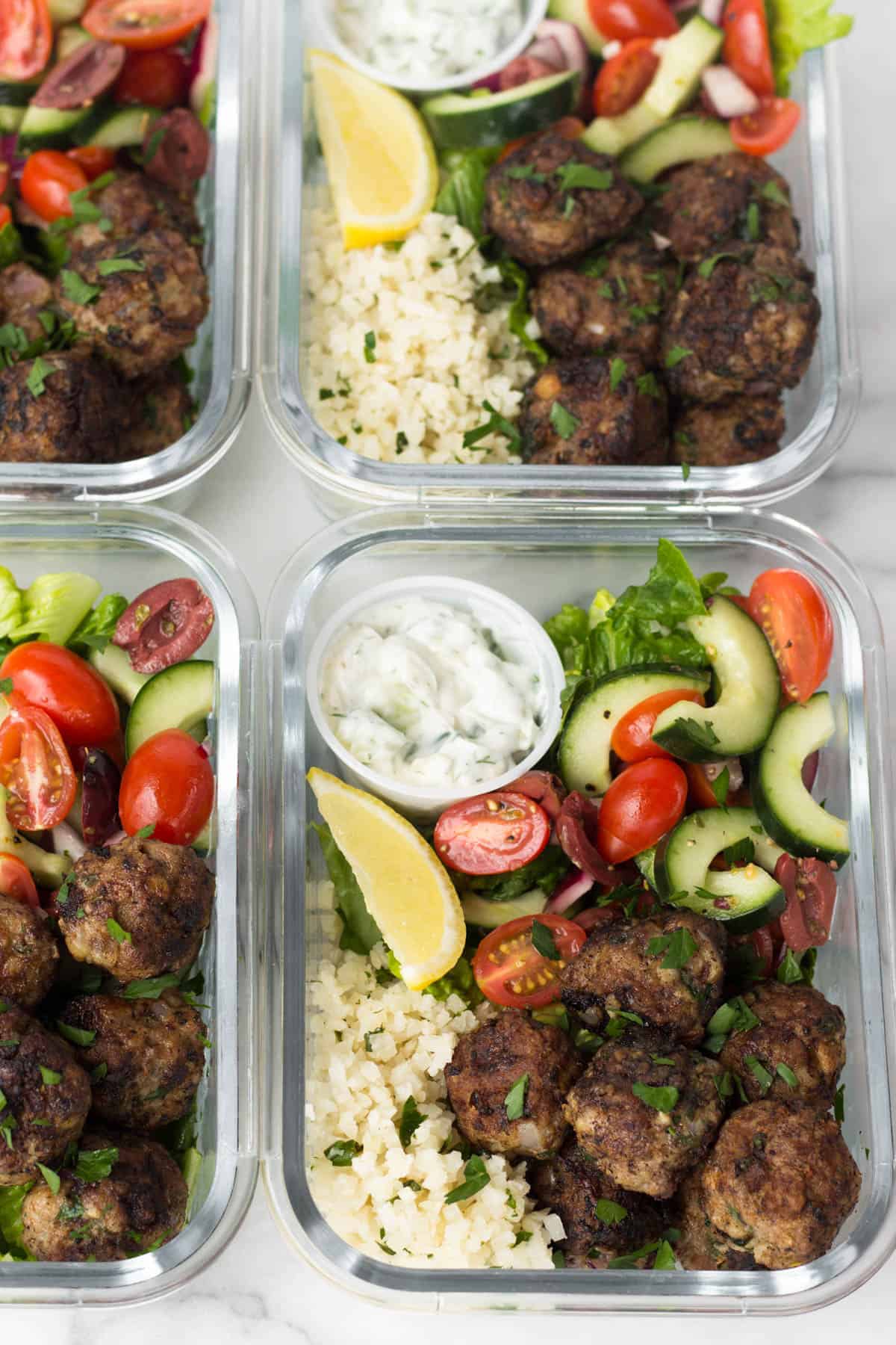 Greek lamb meatballs bowls with veggies and homemade sauce. Meal Prep Lunch Recipes