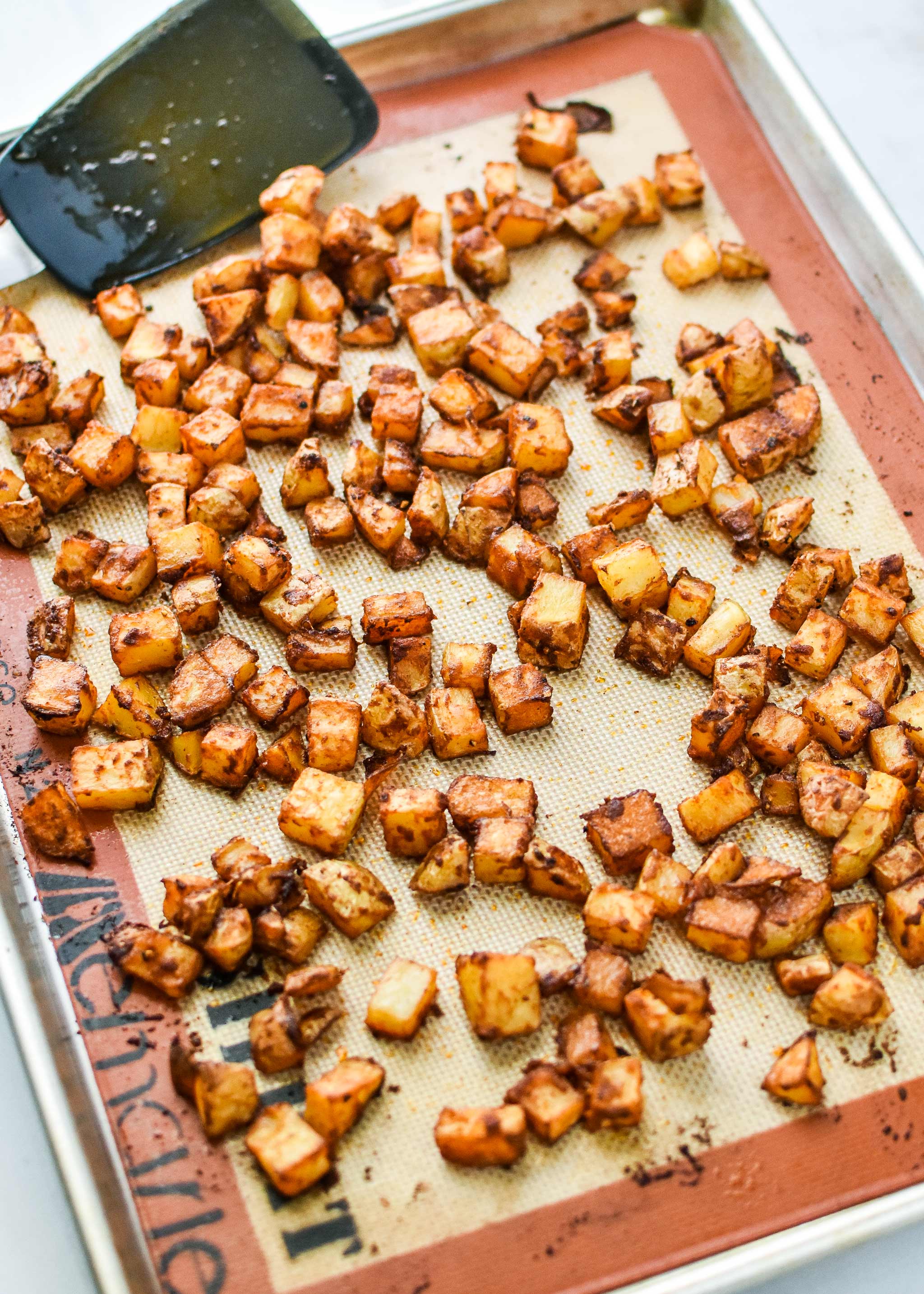 crispy looking breakfast potatoes on a sheet pan