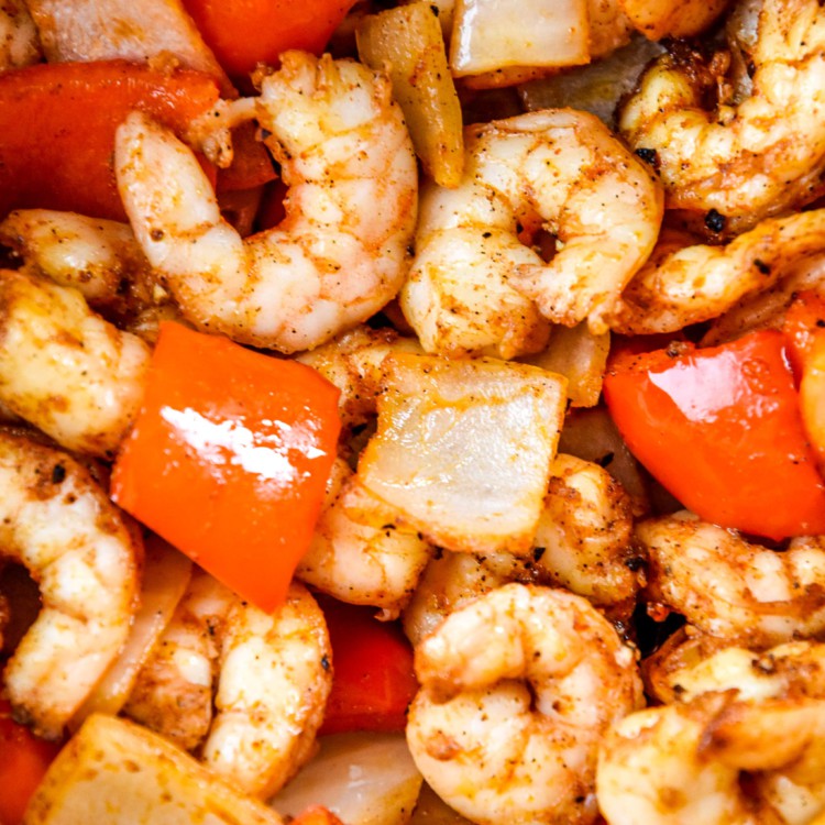 close up of the shrimp, bell peppers and onions