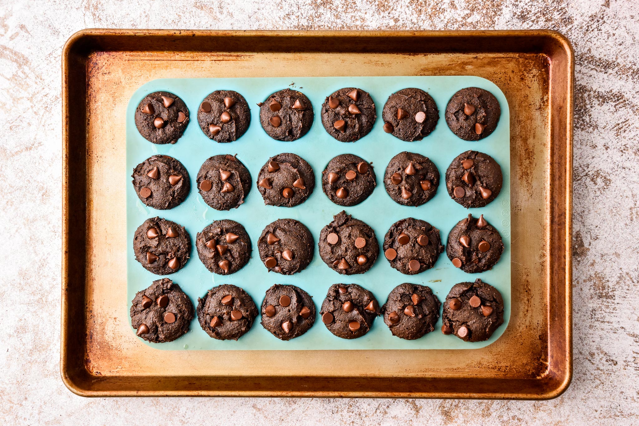 just baked pumpkin spice brownie bites in the mini muffin pan