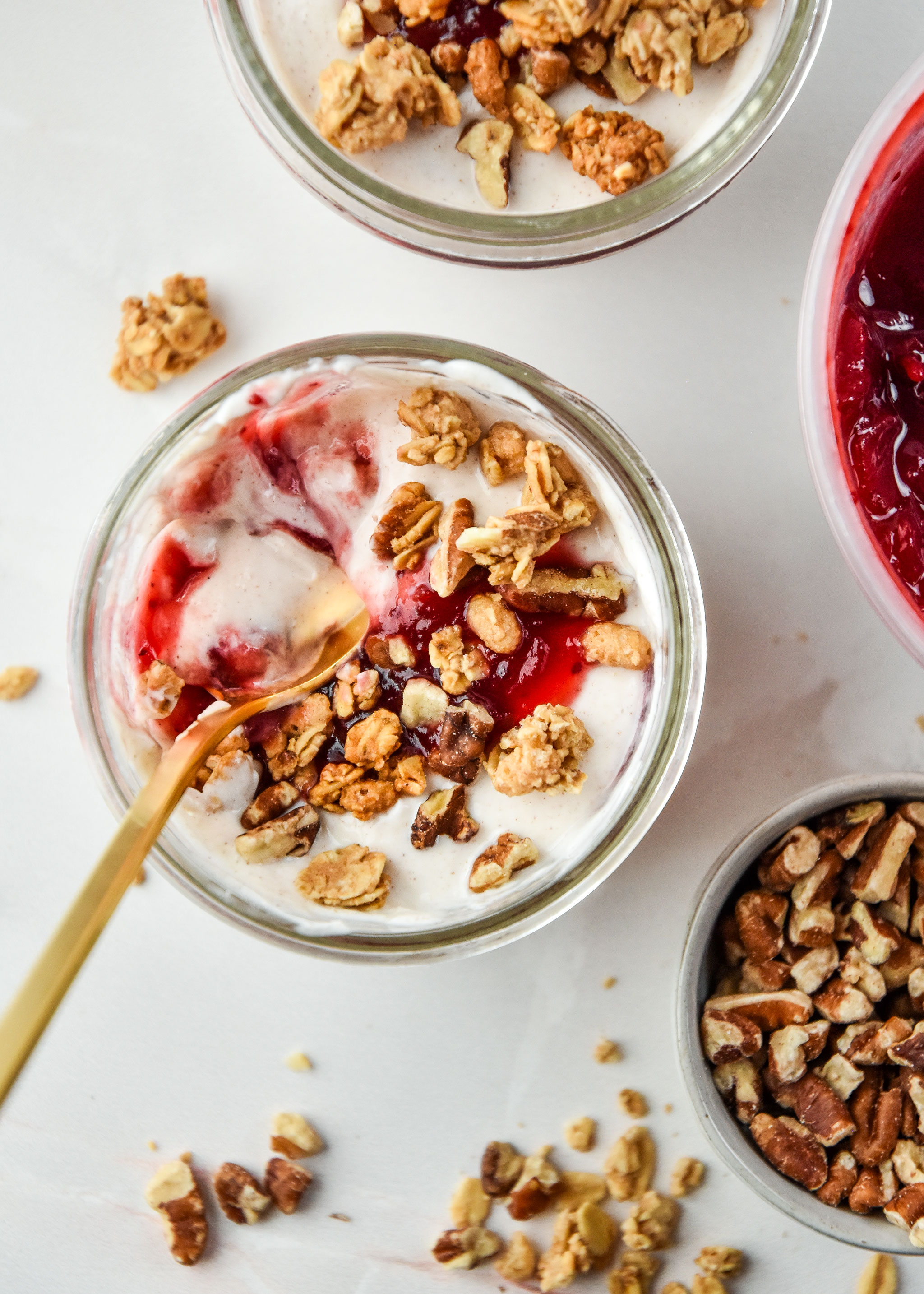 Top view of cinnamon orange yogurt parfaits with granola on top