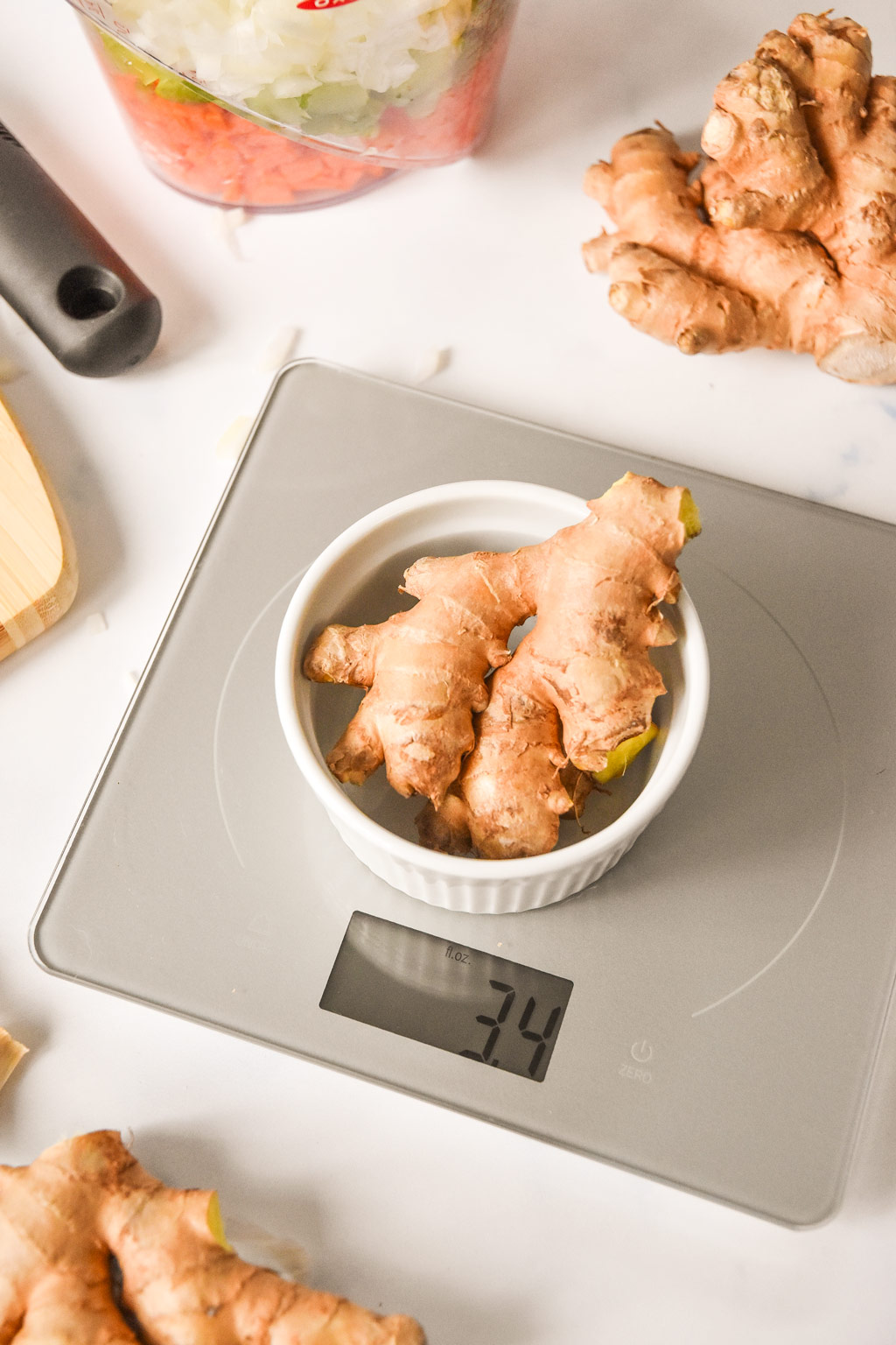 weighing fresh ginger for the instant pot ginger chicken & rice soup.