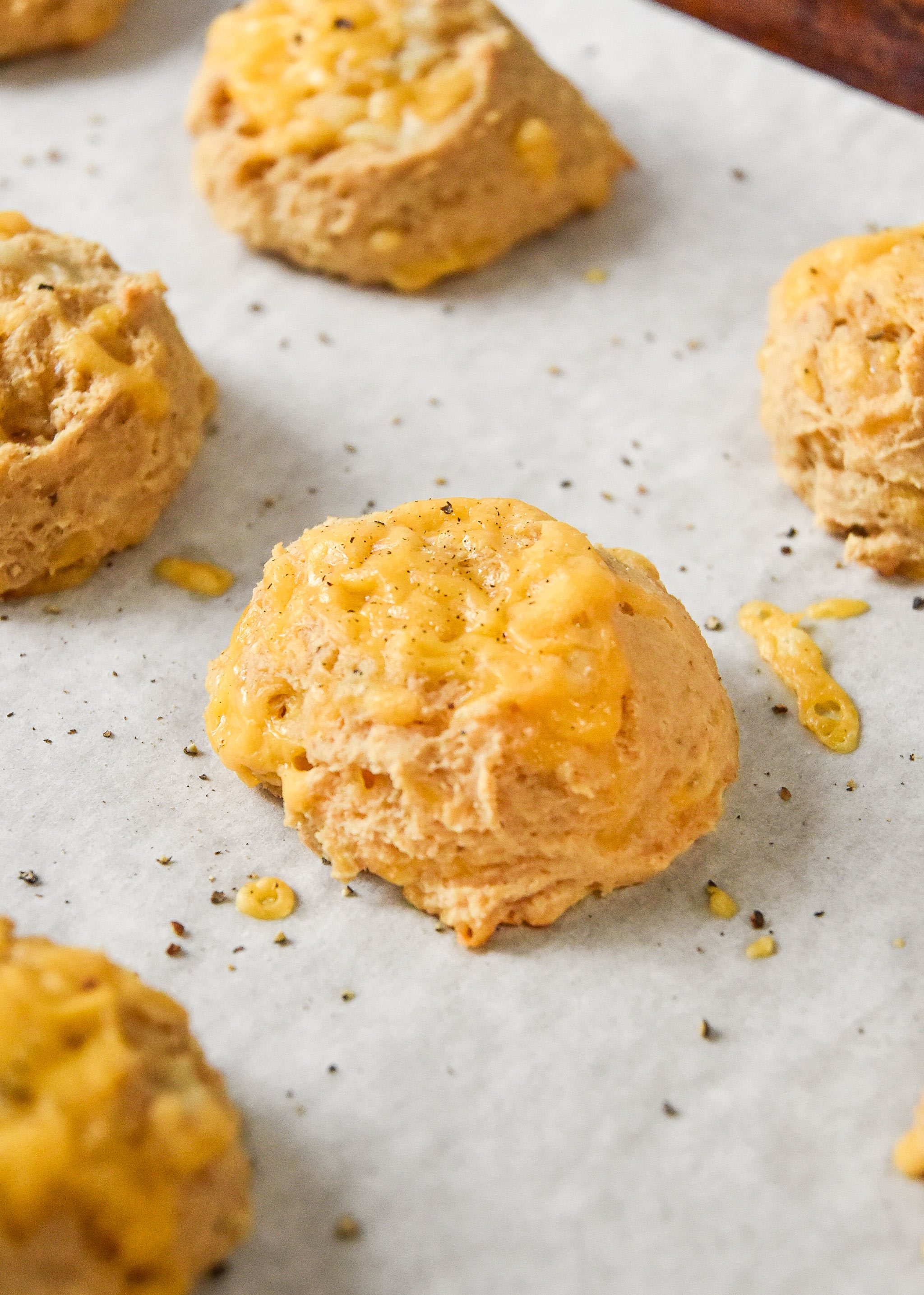 cooked biscuits on a sheet pan.