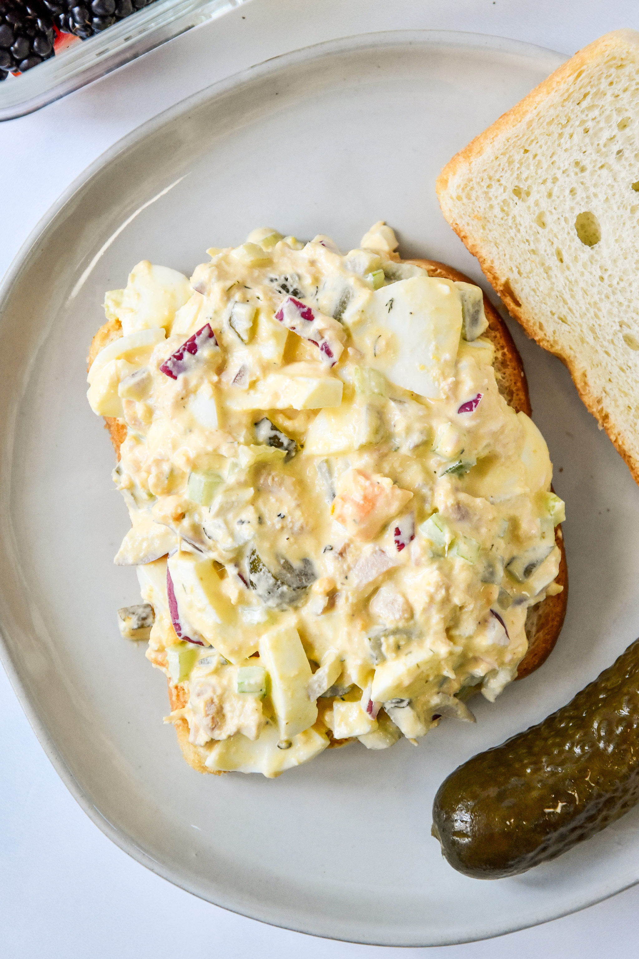 tuna egg salad on white bread.