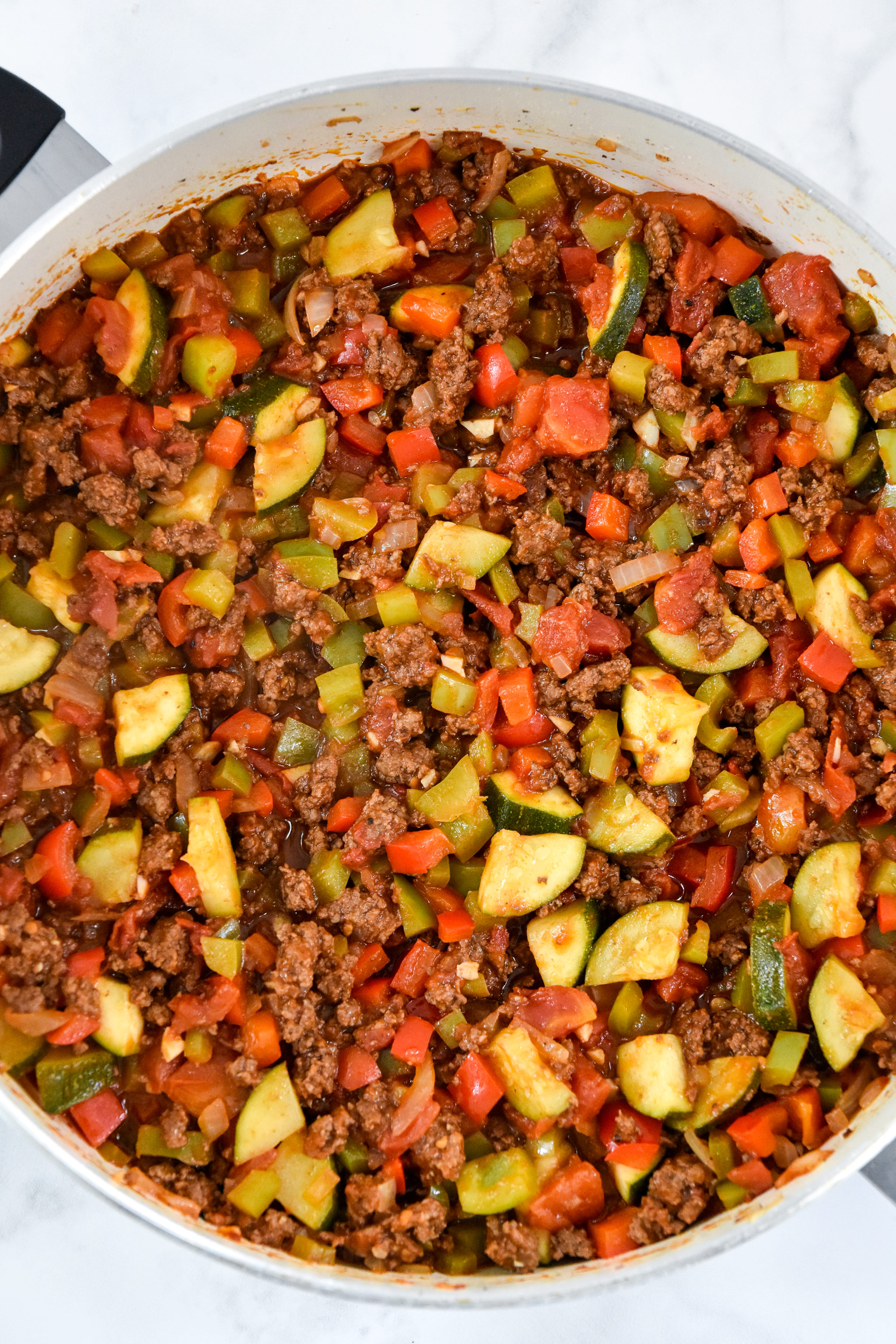 just cooked unstuffed pepper bowls in a skillet.