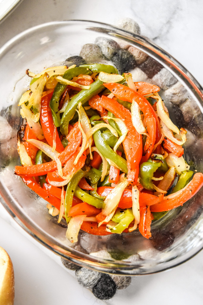 bowl of cooked peppers and onions in a bowl.