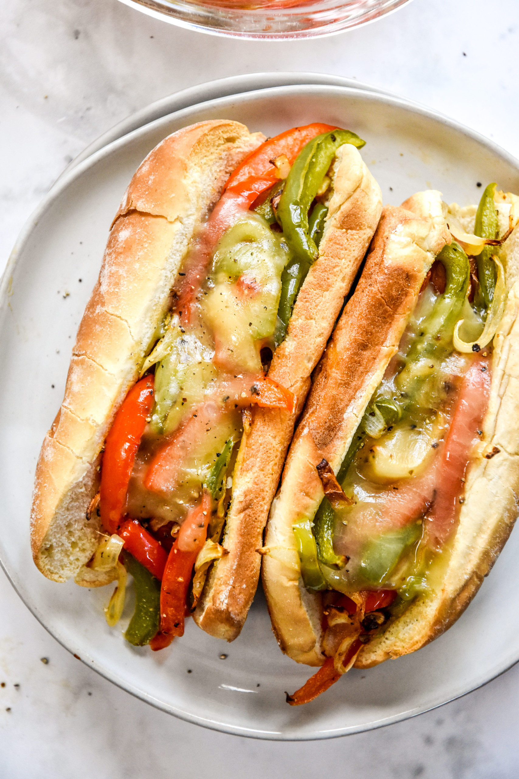 Air Fryer Sausage Dogs with Peppers and Onions