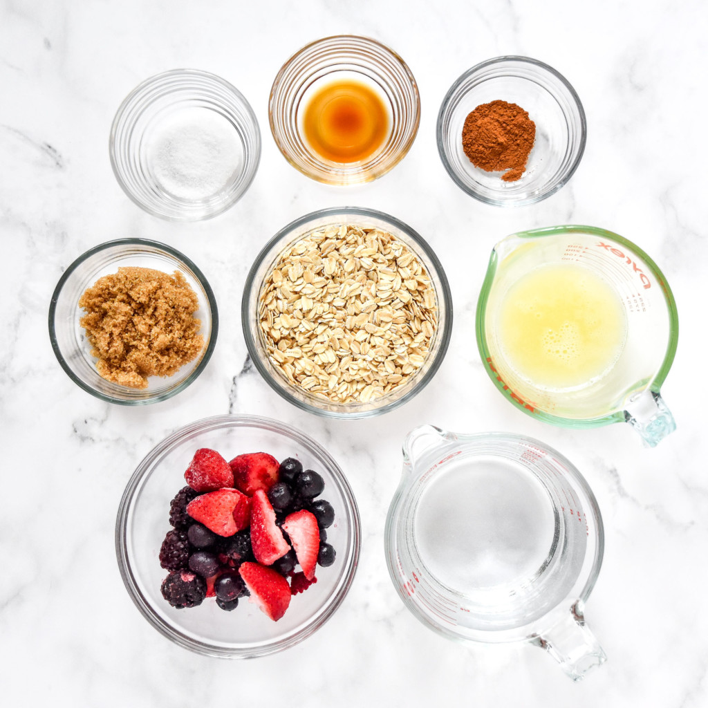 ingredients on the counter for the stovetop triple berry egg white oatmeal.