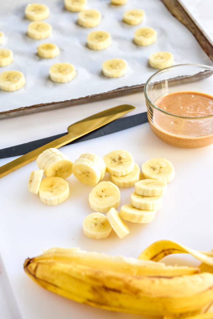 cut up bananas on a cutting board.