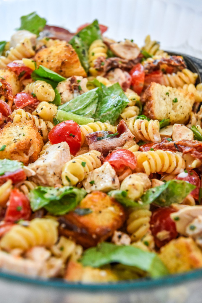 large bowl of chicken club pasta salad from the side.
