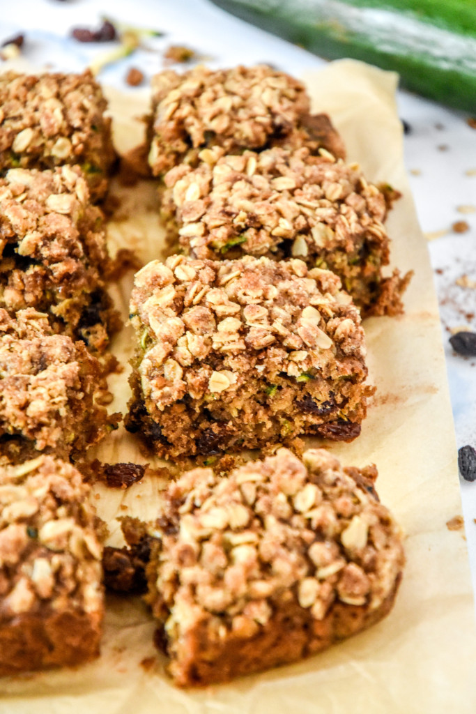 cinnamon raisin zucchini coffee cake cut into squares.