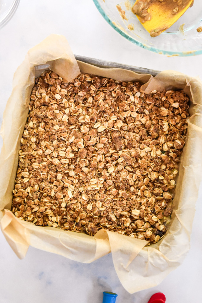 This Cinnamon Raisin Zucchini Coffee Cake is easy to make, seriously delicious, and not-too-sweet! It's a make-ahead friendly breakfast or snack cake made with rolled oats, raisins, one whole zucchini, and a cinnamon crumb topping! ProjectMealPlan.com