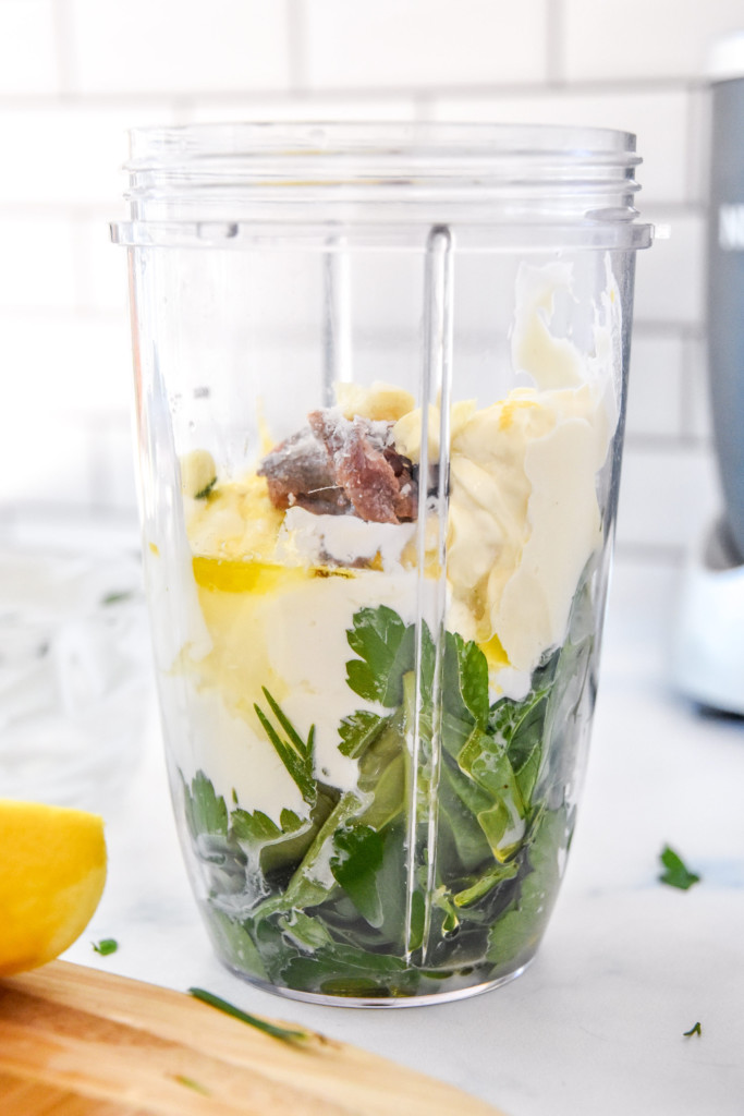 all ingredients to make the sauce for the green goddess tuna salad before blending.