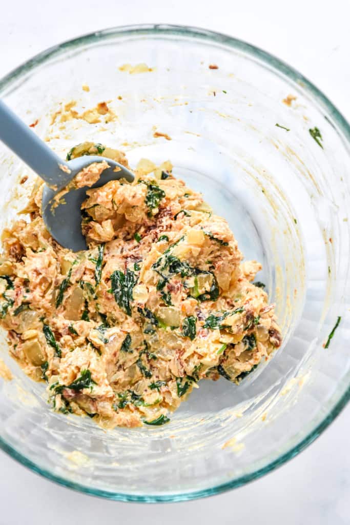 mixed filling with sun dried tomatoes and spinach for the air fryer stuffed chicken breast.