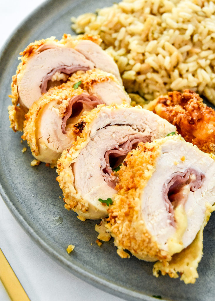 sliced chicken cordon bleu on a plate.
