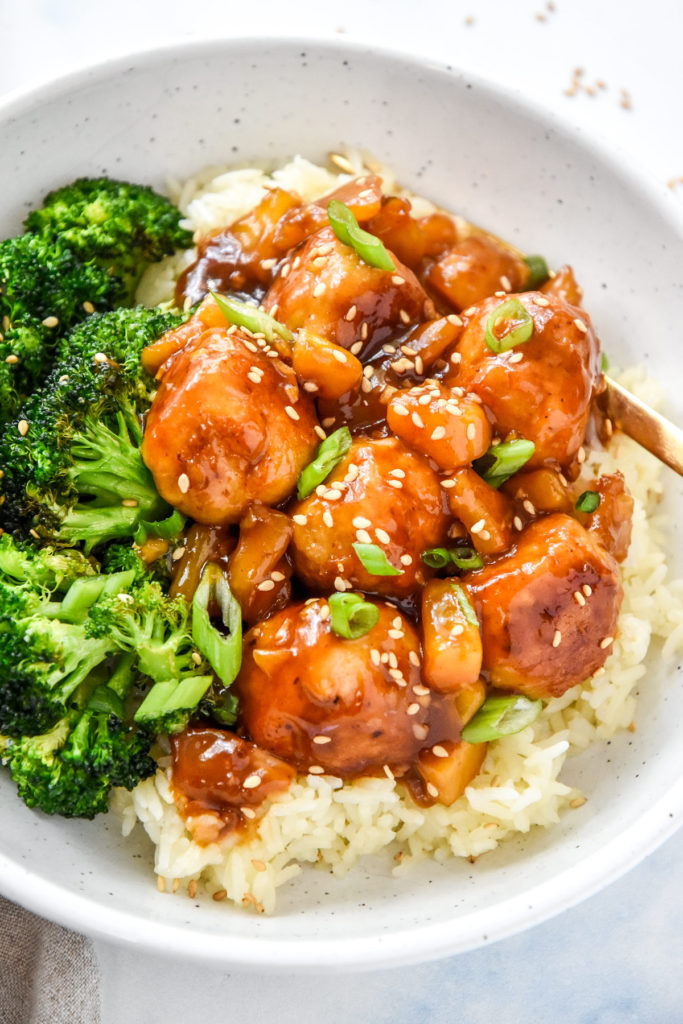 homemade pineapple teriyaki chicken meatballs with broccoli over rice.