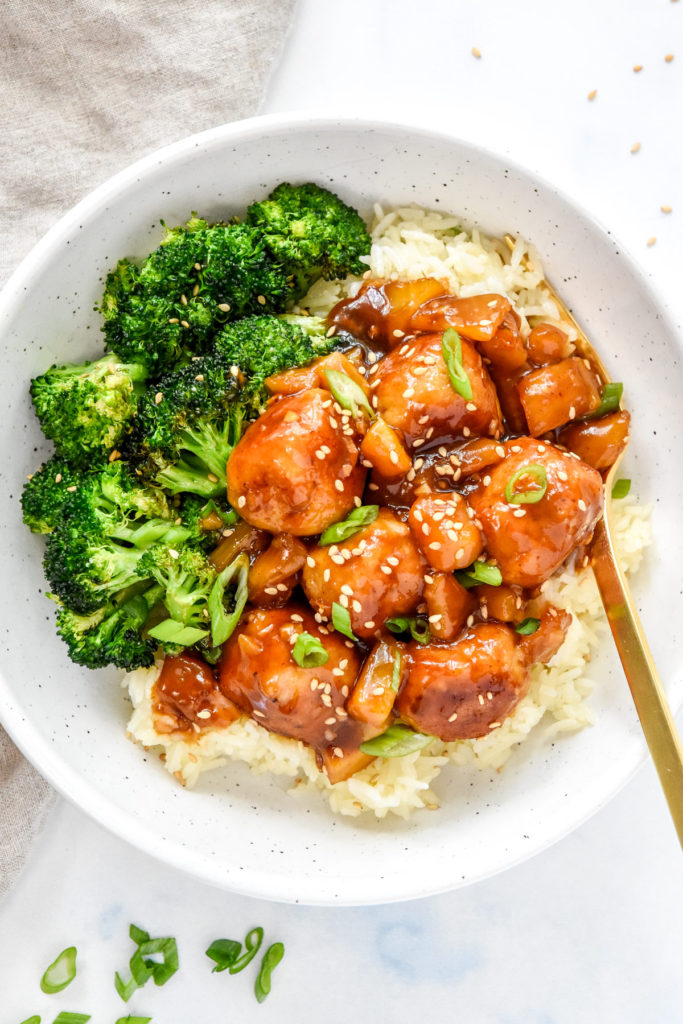 homemade pineapple teriyaki chicken meatballs with broccoli over rice.