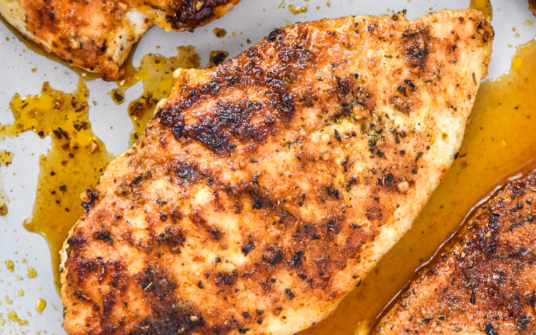 Thin Sliced Stovetop Chicken Breast just cooked in a nonstick pan.