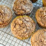 oatmeal applesauce blender muffins on a wire cooling rack.